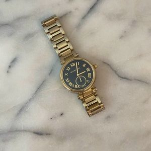 Women’s Gold Michael Kors watch